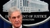 FILE - U.S. Special Counsel Robert Mueller talks to reporters about the Russia probe in this undated photo. 