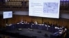 第二次听证会上展示中国所说的“再教育营” 。(法新社June 4, 2021)