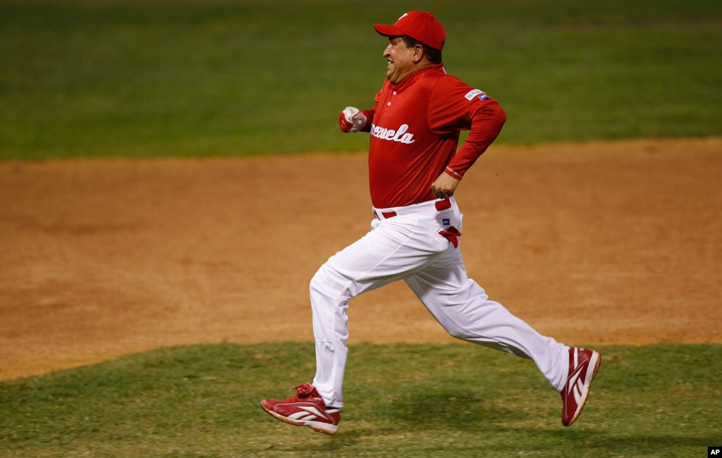 Chavez runs the bases after hiting a double during an exhibition softball game in Caracas, February 11, 2010.