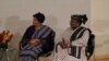 International Monetary Fund Managing Director Christine Lagarde, left, and Nigeria's Finance Minister Ngozi Okonjo-Iweala confer during roundtable meeting with Nigerian business executives in Lagos, Nigeria.