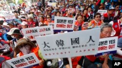 南韓民眾2019年8月13日在首爾集會抗議日本對韓的出口貿易政策。