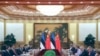 资料照：2018年9月18日，中国国家主席习近平(左二)在人民大会堂会见爱沙尼亚总统卡留莱德(右四)。