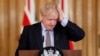 Britain's Prime Minister Boris Johnson reacts during a press conference at Downing Street on the government's coronavirus action plan in London, March 3, 2020.