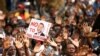 Supporters of the opposition Movement for Democratic Change (MDC) party take part in anti-government protests over economic hardships in Harare, Zimbabwe, Nov. 29, 2018.