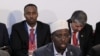 President of Somalia Sheikh Sharif Ahmed, center, during the Somalia Conference at Lancaster House in London, Thursday, Feb. 23, 2012.