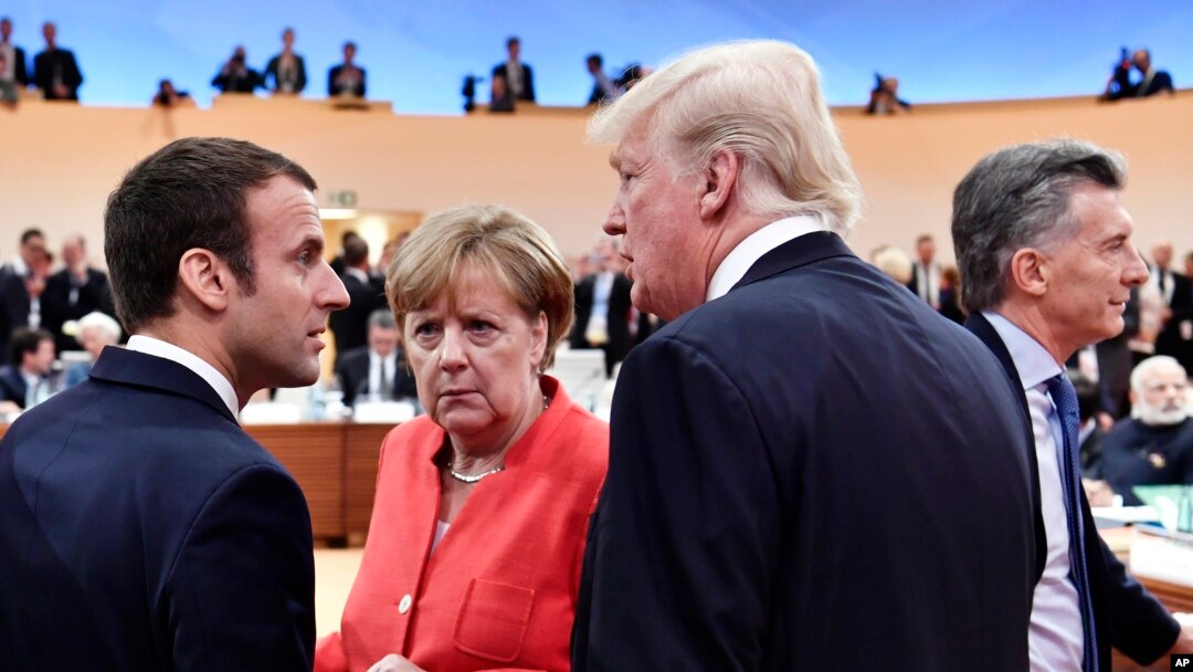 Francuski predsednik Emanuel Makron, nemačka kancelarka Angela Merkel i američki predsednik Tramp na samitu G20. 