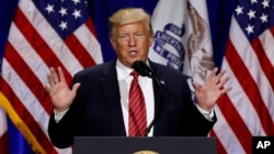 President Donald Trump speaks during the Republican Party of Iowa's America First Dinner, June 11, 2019, in West Des Moines, Iowa.