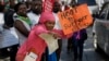 Doctors and other medical staff protest the detention of their union leaders, outside an appeal court in Nairobi, Kenya, Feb. 15, 2017.