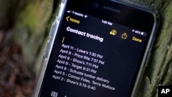 A smartphone belonging to Drew Grande, 40, of Cranston, R.I., shows notes he made for contact tracing April 15, 2020.