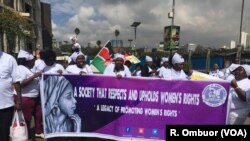 Women demonstrators, including Members of the Kenya Association of Breastfeeding Mothers, hold a protest march in Nairobi, Kenya, May 15, 2018, against a restaurant that allegedly asked a breastfeeding mother to 'Cover up or breastfeed in the toilet."
