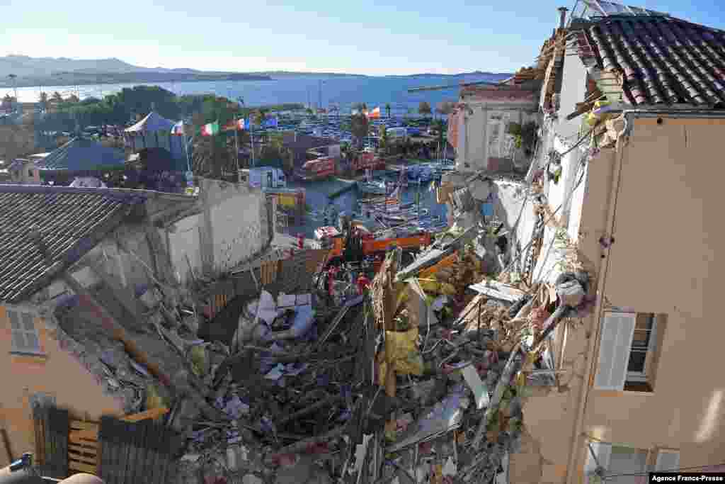 French firefighters search for survivors in the rubble after a building collapsed in Sanary-sur-Mer, France.&nbsp;Five people likely are&nbsp; trapped in the rubble of a three-story apartment building that collapsed overnight following an explosion that may have been caused by a gas leak, according to the firefighters.