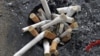 Cigarette butts are seen in an ashtray in Los Angeles, California, May 31, 2012. 