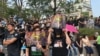 Hong Kong protesters rally in Tsim Sha Tsui against police brutality on Sunday, October 27.