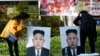 지난 4월 서울에서 북한의 핵 실험과 미사일 도발, 인권 유린을 규탄하는 집회가 열린 가운데, 김정은 북한 국무위원장의 사진이 걸려있다. (자료사진)