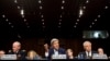 General Martin E. Dempsey (L), John Kerry, U.S. Secretary of State (C), and Chuck Hagel, Secretary of Defense, present the administration's case for U.S. military action against Syria to a Senate Foreign Relations Committee, Sept. 3, 2013.
