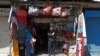 འགྲོ་འོང་བཀག་སྡོམ་གྱིས་རྡ་སའི་ཚོང་ལས་ལ་གྱོང་གུད།