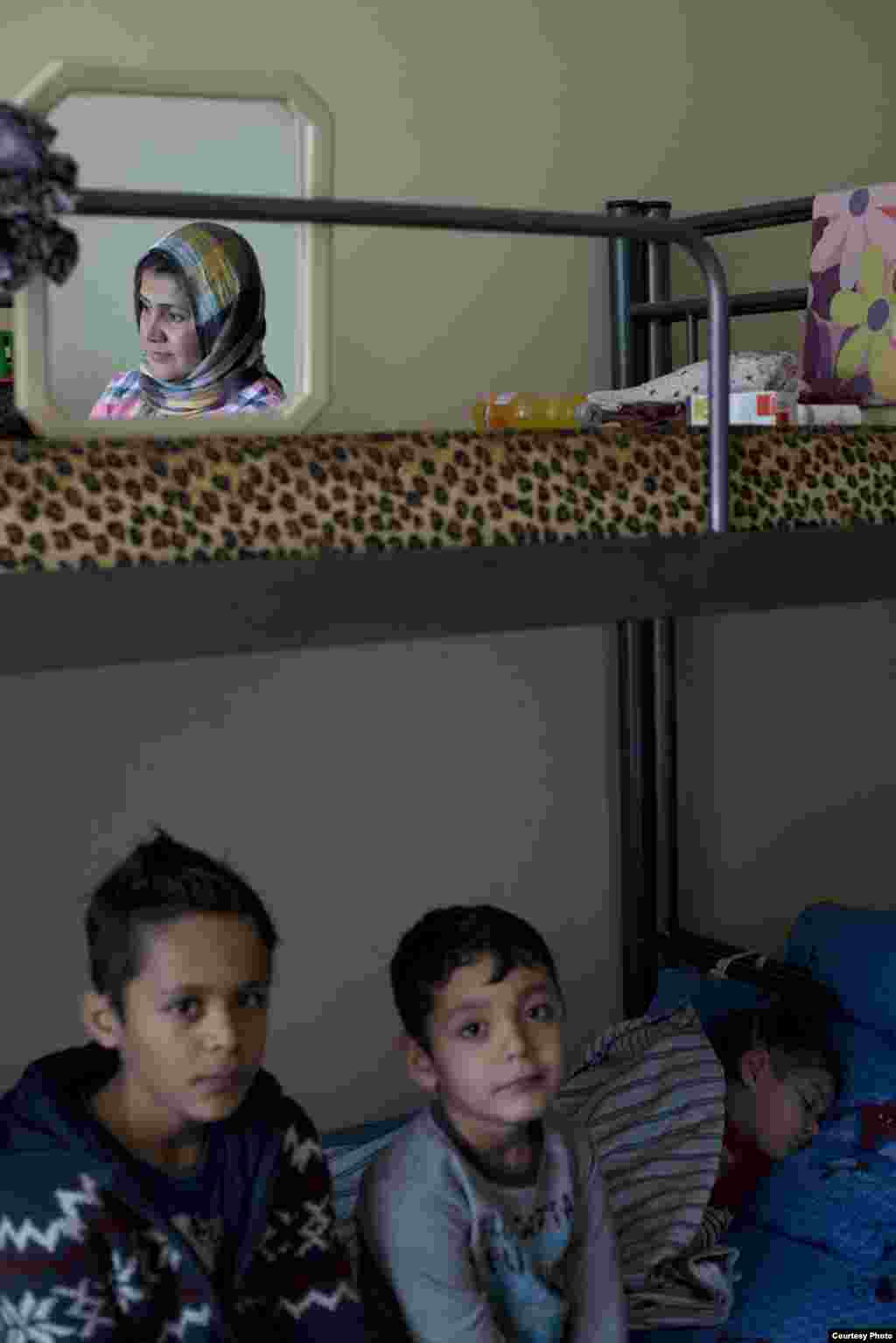 Mother Ihlas Kambar, 36, lives with her two children, Faris and Ahmed, and the baby of the brother of her husband. They are in Busmanci Detention centre in Sofia. UNHCR/D.Kashavelov