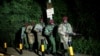 Kenyan Defense Forces leave the vicinity of the Westgate Mall in Nairobi, Sept. 23 2013.