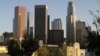 The sun sets on the downtown Los Angeles skyline, Oct. 11, 2017. Los Angeles wants to connect devices on the "Internet of Things" to become a smart city.