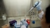 A scientist prepares a blood sample in a laboratory at the Center for Scientific Research Caucaseco in the outskirts of Cali, Colombia, April 25, 2012 (file photo).