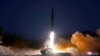 FILE - This picture taken on Jan. 11, 2022, and released by North Korea's official Korean Central News Agency on Jan. 12, 2022, shows what North Korea says a hypersonic missile test-firing conducted by the Academy of Defense Science of the DPRK at an undisclosed location.