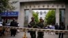 在2014年5月23日乌鲁木齐市发生自杀炸弹袭击后，中国武警在乌鲁木齐第五中学门前站岗（2014年5月23日）