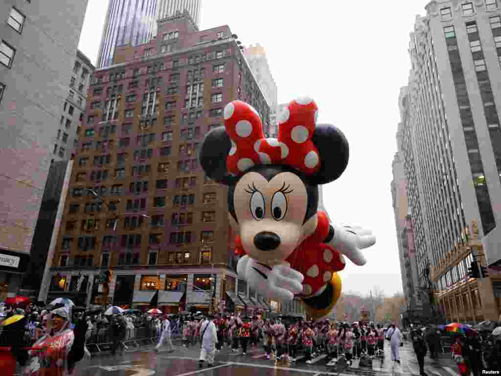 Disney’s Minnie Mouse balloon flies during the 98th Macy's Thanksgiving Day Parade in New York City, Nov. 28, 2024.