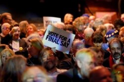 People attend a "Stop the Brexit landslide" rally in London, Dec. 6, 2019.