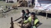 ကချင်ပြည်နယ် လိုင်ဇာမြို့ အနီးက ကချင်စစ်ပြေးဒုက္ခသည်စခန်းတွင်းက ကလေးငယ်များ ( ဇန်နဝါရီ ၄၊ ၂၀၁၃)။