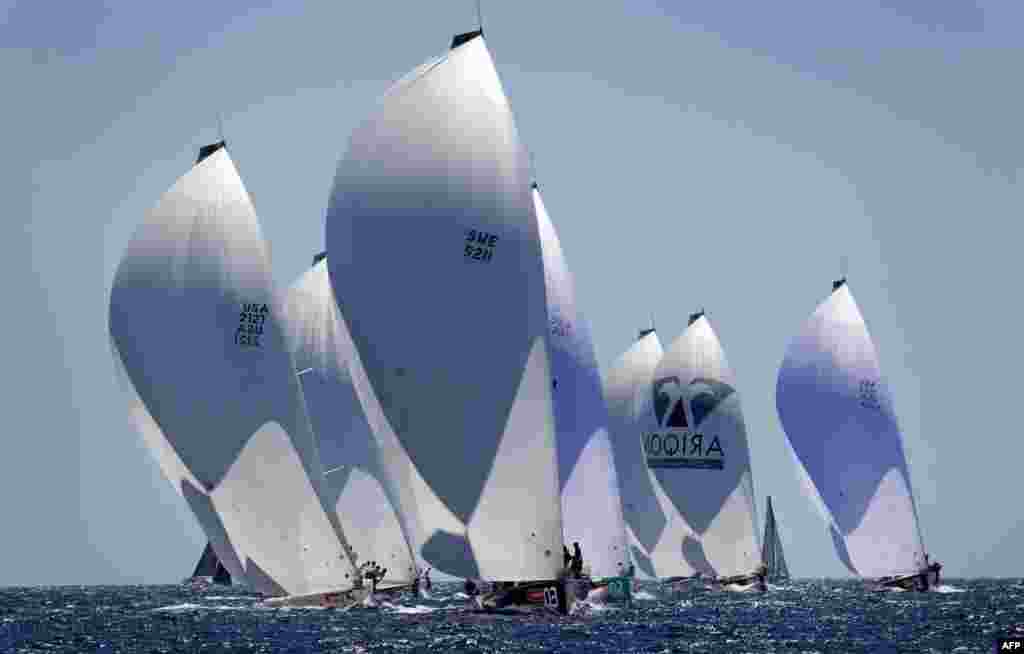 Sailboats compete in the 32th edition of the Copa del Rey regatta in Palma de Mallorca, Spain.
