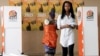 First Postwar Generation Casts Historic Vote in Mozambique Election