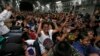 Typhoon Evacuees Wait Out Life in Manila