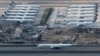 香港爆发新冠疫情后机场停机坪上国泰航空公司停飞的飞机。（2020年3月5日）