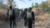 Les forces camerounaises patrouillent près du village de Mabass, dans le nord du Cameroun, le 16 février 2015