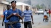 Burundi police patrol the streets of Musaga district in the capital Bujumbura after the results of the presidential elections were released, July 24, 2015.