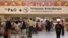 In this file photo taken on Tuesday, Feb. 14, 2017, passengers are queuing up for the security checks at the 2nd Kuala Lumpur International Airport in Sepang, Malaysia 