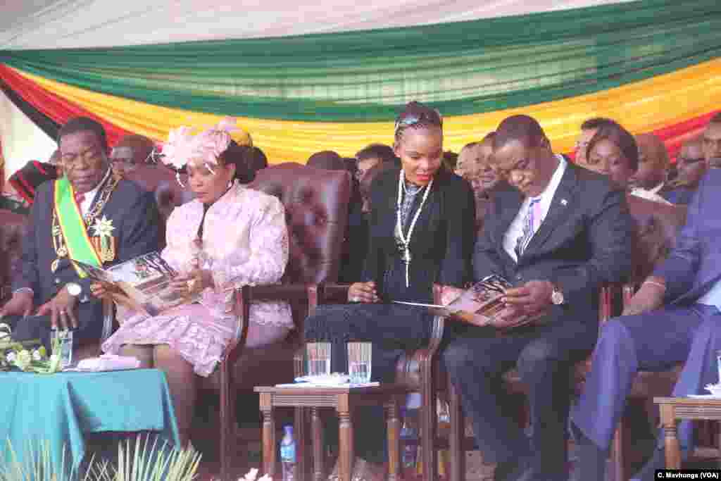 President Emmerson Mnangagwa and his wife Auxillia and vice president Constantino Chiwenga and his wife Mary follow inauguration proceedings, Aug. 26, 2018, in Harare.