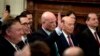 Acting United States Attorney General Matt Whitaker waves as he is recognized by President Donald Trump during a Medal of Freedom ceremony in the East Room of the White House in Washington, Nov. 16, 2018. 