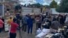 Volunteers bring donated goods to be transported to Chimanimani and other affected areas by Cyclone Idai, March 19, 2019. 