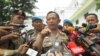 Kapolri Jenderal Tito Karnavian di kompleks Istana Kepresidenan memberikan keterangan seputar tertembaknya buronan teroris Santoso (19/7). (VOA/Andylala Waluyo)