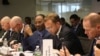 Somali Finance Minister Abdirahman Duale Beileh (center) is seen flanked by participants of International Monetary Fund (IMF) and World Bank meetings last week in Washington. (Twitter - @DrBeileh)