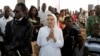 Christian worshipers pray during Christmas mass at a Church in Khartoum, Sudan, Dec. 25, 2013. 