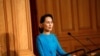 Myanmar's State Counsellor Aung San Suu Kyi gives a speech at the Swedish parliament in Stockholm