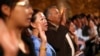 New citizens are naturalized during a U.S. Citizenship and Immigration Services naturalization ceremony in Oakland, California, Aug. 13, 2013. 