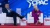U.S. Senator Ted Cruz, left, and U.S. Attorney General Pam Bondi speak at the Conservative Political Action Conference at the Gaylord National Resort & Convention Center in Oxon Hill, Maryland, Feb. 20, 2025.