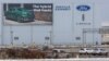 Vehicles speed past Ford's Oakville Assembly Plant as trade tensions escalate over U.S. tariffs and retaliatory measures by Canada, Oakville, Ontario, Canada, Feb. 2, 2025. 