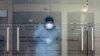 A health worker remains inside the clinical studies center of the Cayetano Heredia University in Lima on September 09, 2020, where a Chinese potential vaccine against COVID-19 will be tested on volunteers. 