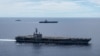 美国海军“罗纳德·里根号”航母与“尼米兹号”航母打击群在南中国海航行。（2020你那7月6日）
