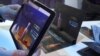 A piece of virtual mail is seen in a screenshot from video (E. Lee/VOA)