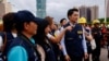 台北市市长蒋万安和他的团队在年度民防演习后 (路透社)